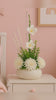 Load and play video in Gallery viewer, Serenity Bloom Pod – White Elegance Artificial Flower Arrangement
